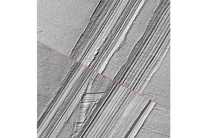 Comparison of screwdriver marks on metal with a silicon casting using a free-rotation split line image